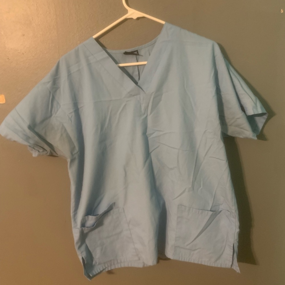 Cherokee baby blue scrub top with two front pockets / Women's Large